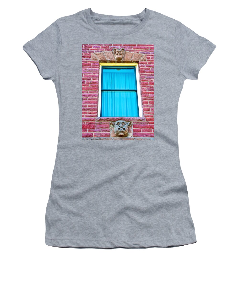 Two Gargoyle-like Figures Above And Below Window Of Moore Block In Pipestone Women's T-Shirt featuring the photograph Two Gargoyle-like Figures Above and Below Window of Moore Block in Pipestone-Minnesota by Ruth Hager