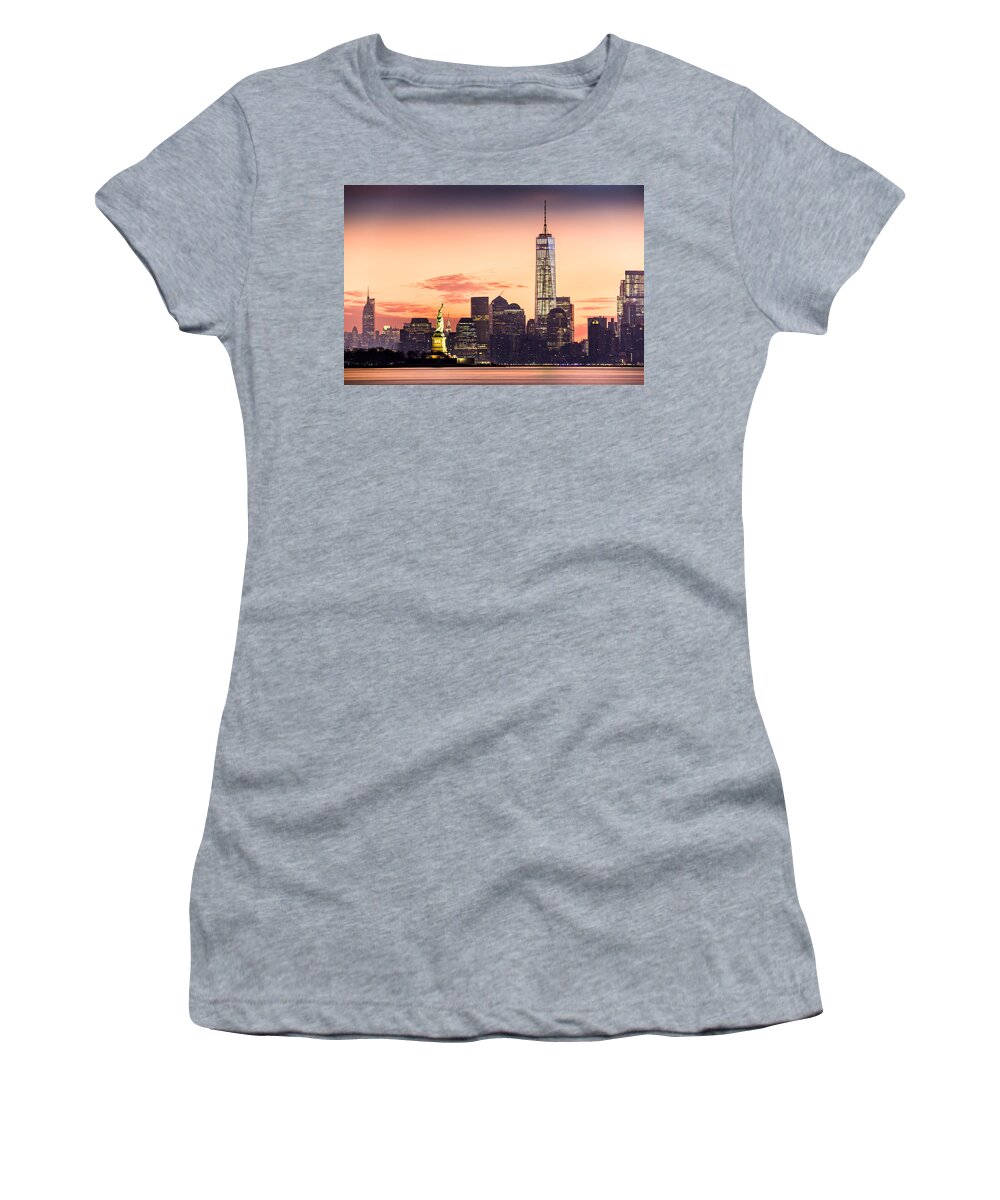 Hudson River Women's T-Shirt featuring the photograph Lower Manhattan and the Statue of Liberty at sunrise #1 by Mihai Andritoiu