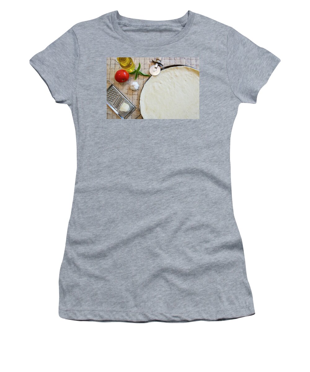 Basil Women's T-Shirt featuring the photograph Cheese margarita pizza ingredients and raw crust with cutter by Karen Foley