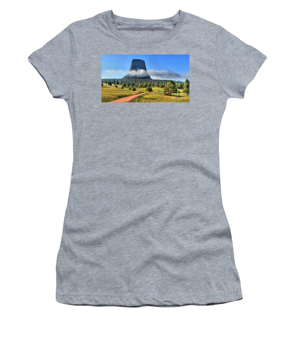 Devils Tower Women's T-Shirt featuring the photograph Fog Around The Tower by Adam Jewell