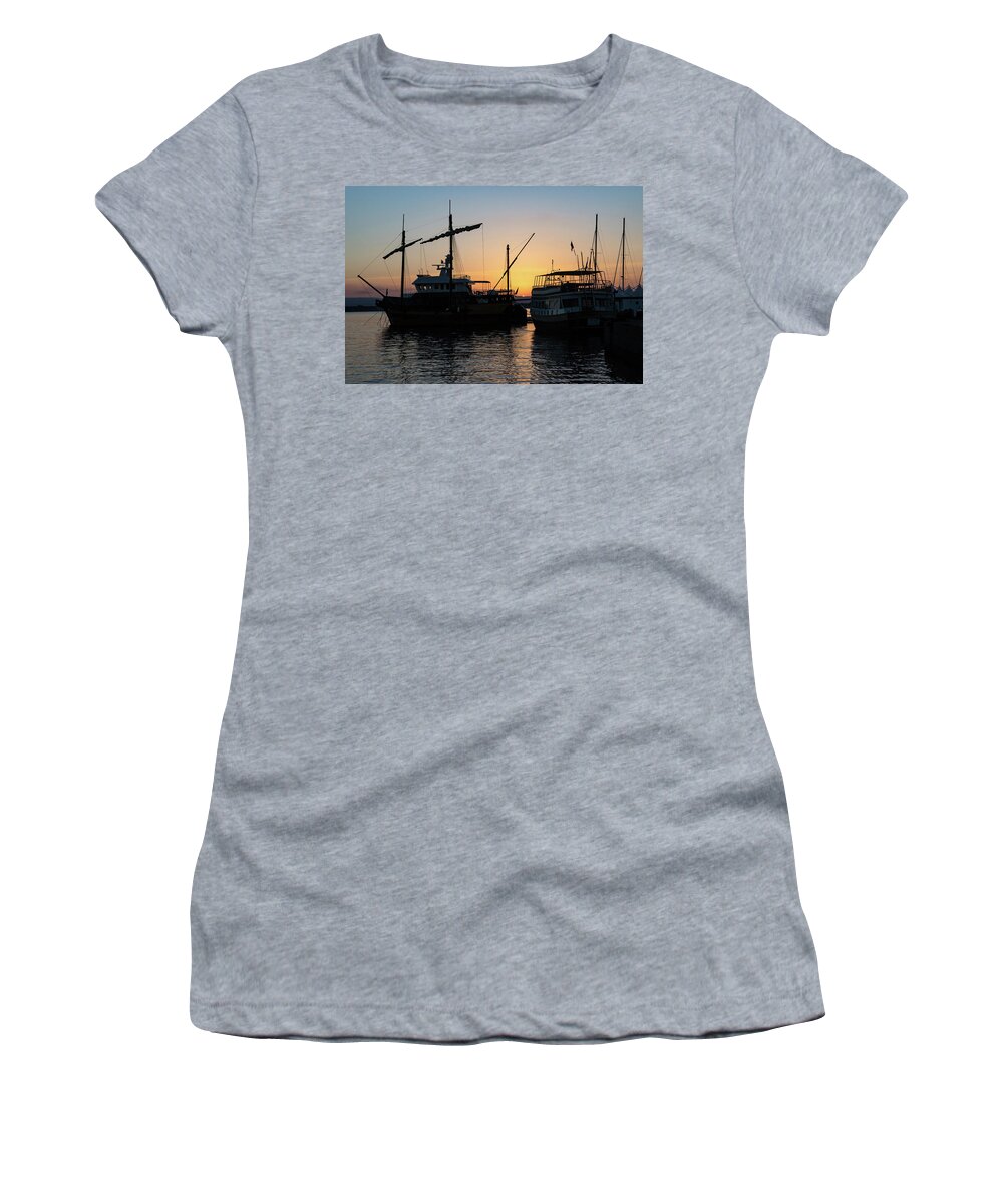 Georgia Mizuleva Women's T-Shirt featuring the photograph Just a Sliver of the Sun - Antique Tourist Boats in Syracuse Sicily by Georgia Mizuleva