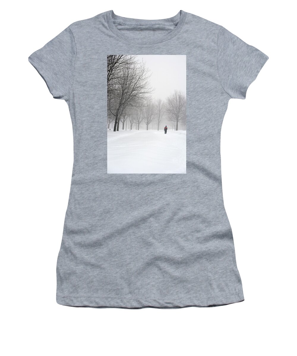 Winter Women's T-Shirt featuring the photograph Man walking in a snowy park by GoodMood Art