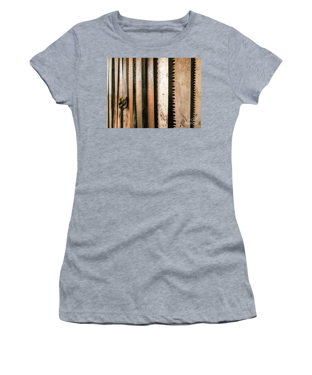 Retired Rusted Cross Saws Women's T-Shirt featuring the photograph Retired Rusted Saws by Lexa Harpell