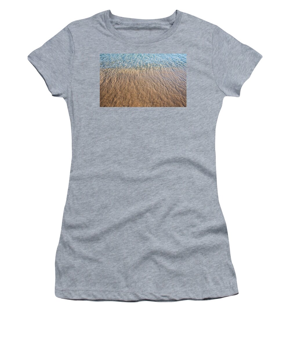 Abstract Women's T-Shirt featuring the photograph Seashore clear water with sandy beach for background by Michalakis Ppalis