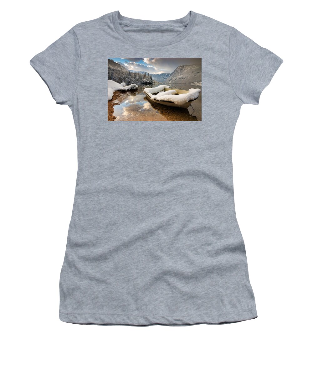 Bohinj Women's T-Shirt featuring the photograph Snow covered boat on Lake Bohinj in Winter by Ian Middleton