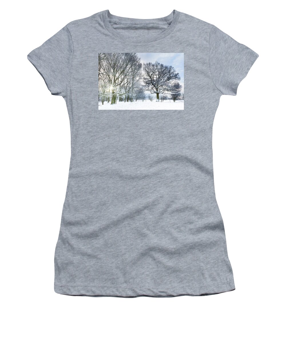 Snow Women's T-Shirt featuring the photograph Snow covered forest with early morning sunrise by Simon Bratt