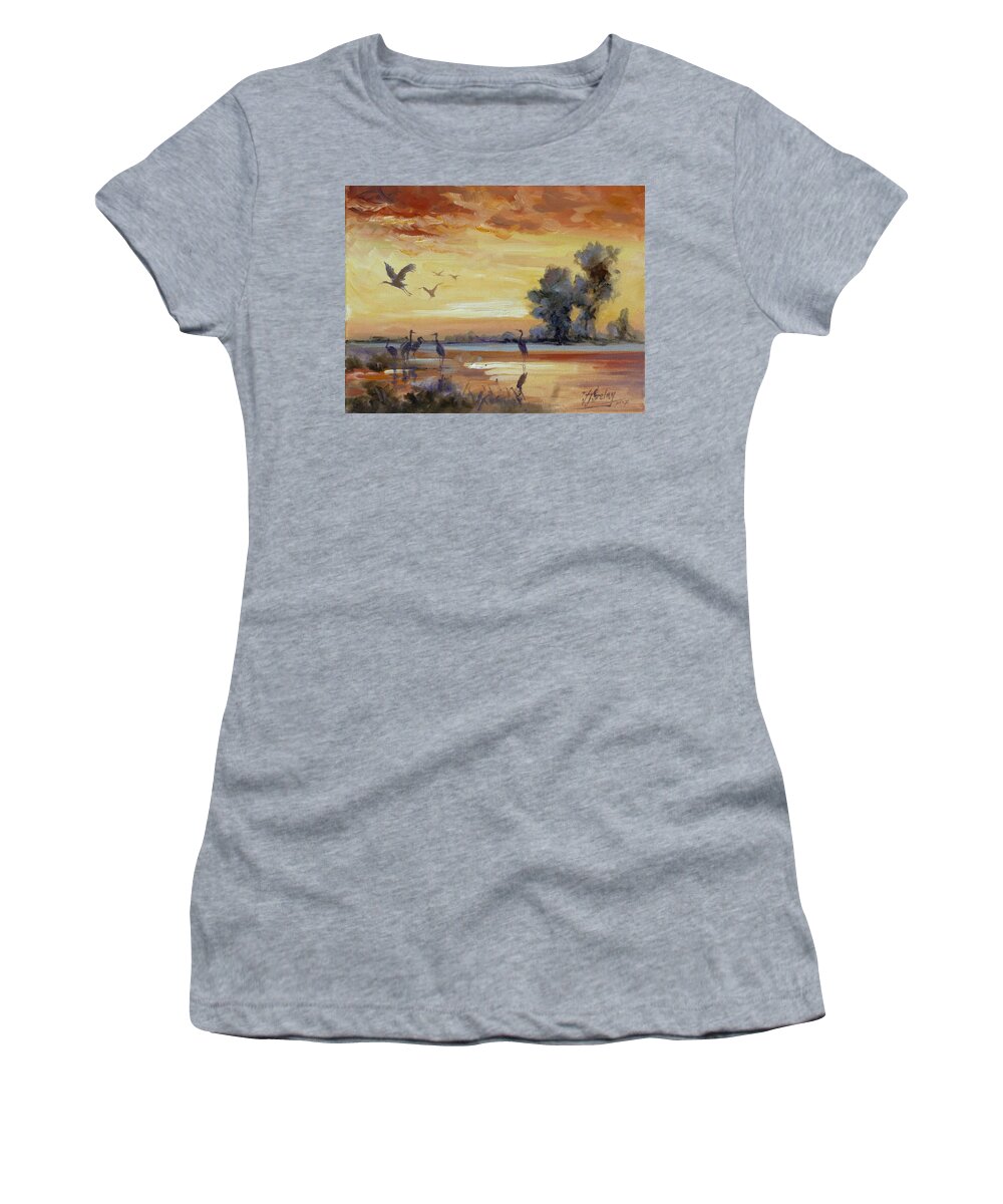 Cranes Women's T-Shirt featuring the painting Sunset on the marshes with cranes by Irek Szelag