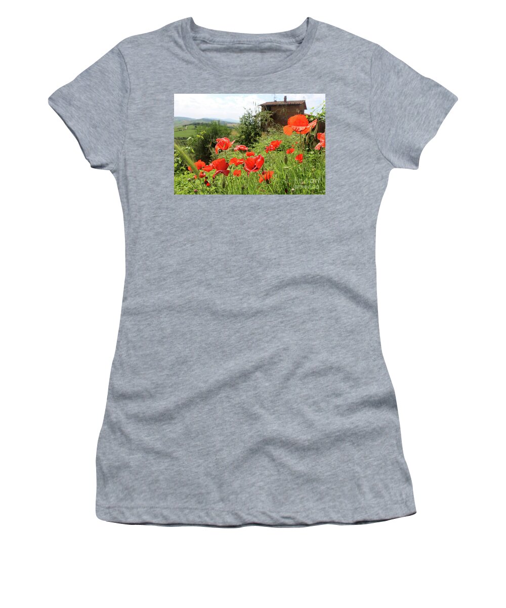 Poppy Women's T-Shirt featuring the photograph Wild red poppy flowers grow in the valley outside the city of Pi by Adam Long