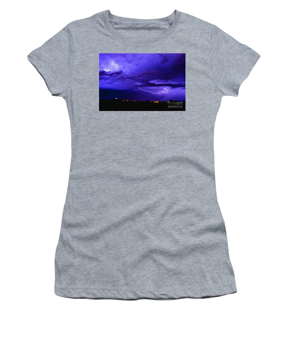 Background Women's T-Shirt featuring the photograph Rays in a night storm with light and clouds. #1 by Joaquin Corbalan