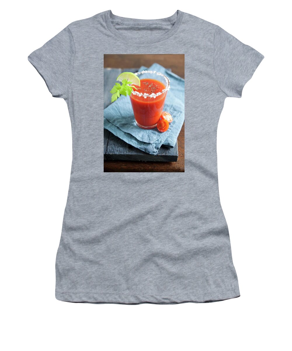 Ip_11172634 Women's T-Shirt featuring the photograph Bloody Mary In A Glass With A Salted Rim by Firmston, Victoria