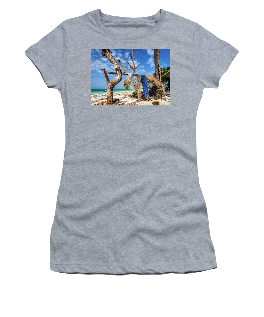 Beach Women's T-Shirt featuring the photograph Fishing nets drying on the beach by Lyl Dil Creations