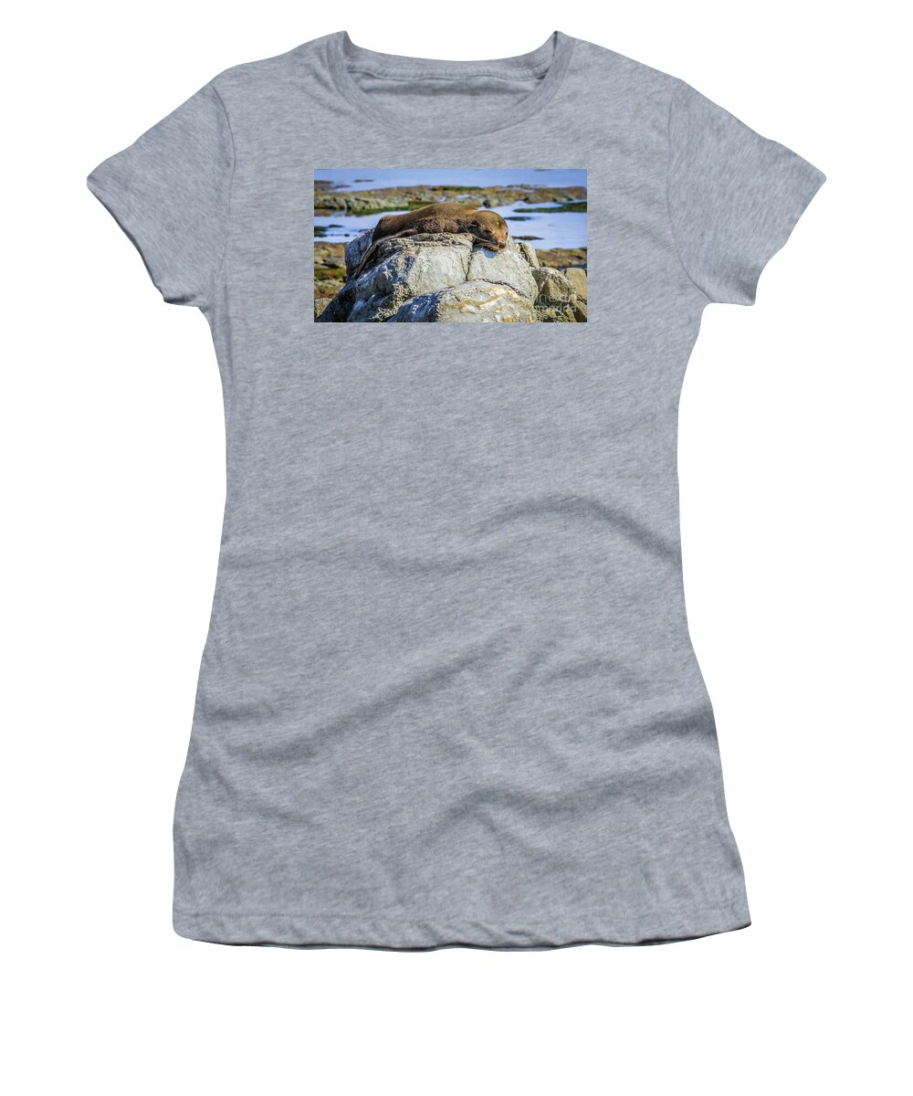 Seal Women's T-Shirt featuring the photograph Lazy fur seal on a rock, Cape Foulwind, New Zealand by Lyl Dil Creations