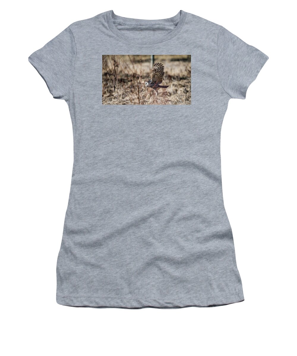 Ural Owl Women's T-Shirt featuring the photograph Ural owl flying close to the ground by Torbjorn Swenelius