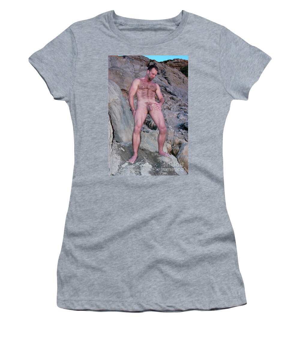 Nude Women's T-Shirt featuring the photograph Handsome and sexy hairy man stands in front of a rocky hillside. by Gunther Allen