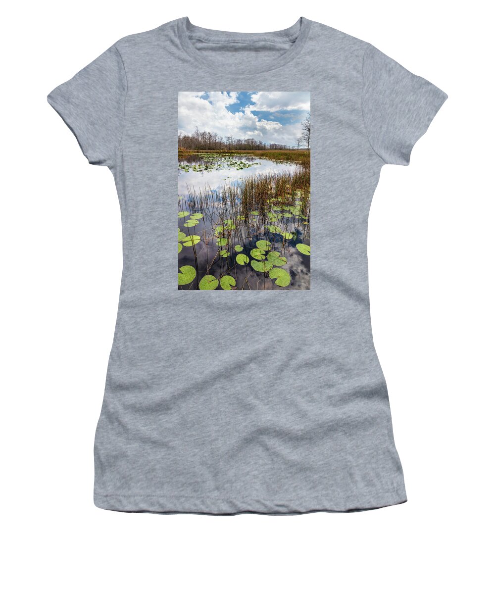 Clouds Women's T-Shirt featuring the photograph Lily Pads Floating on the Glades by Debra and Dave Vanderlaan