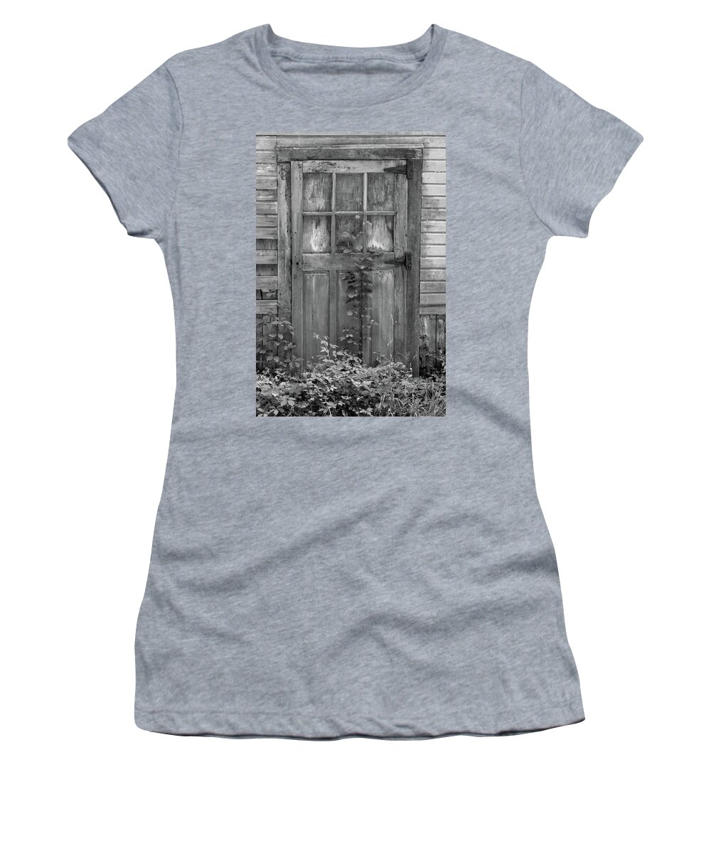 Black And White Barn Women's T-Shirt featuring the photograph Weathered Wood Barn Door with Vine by David Letts