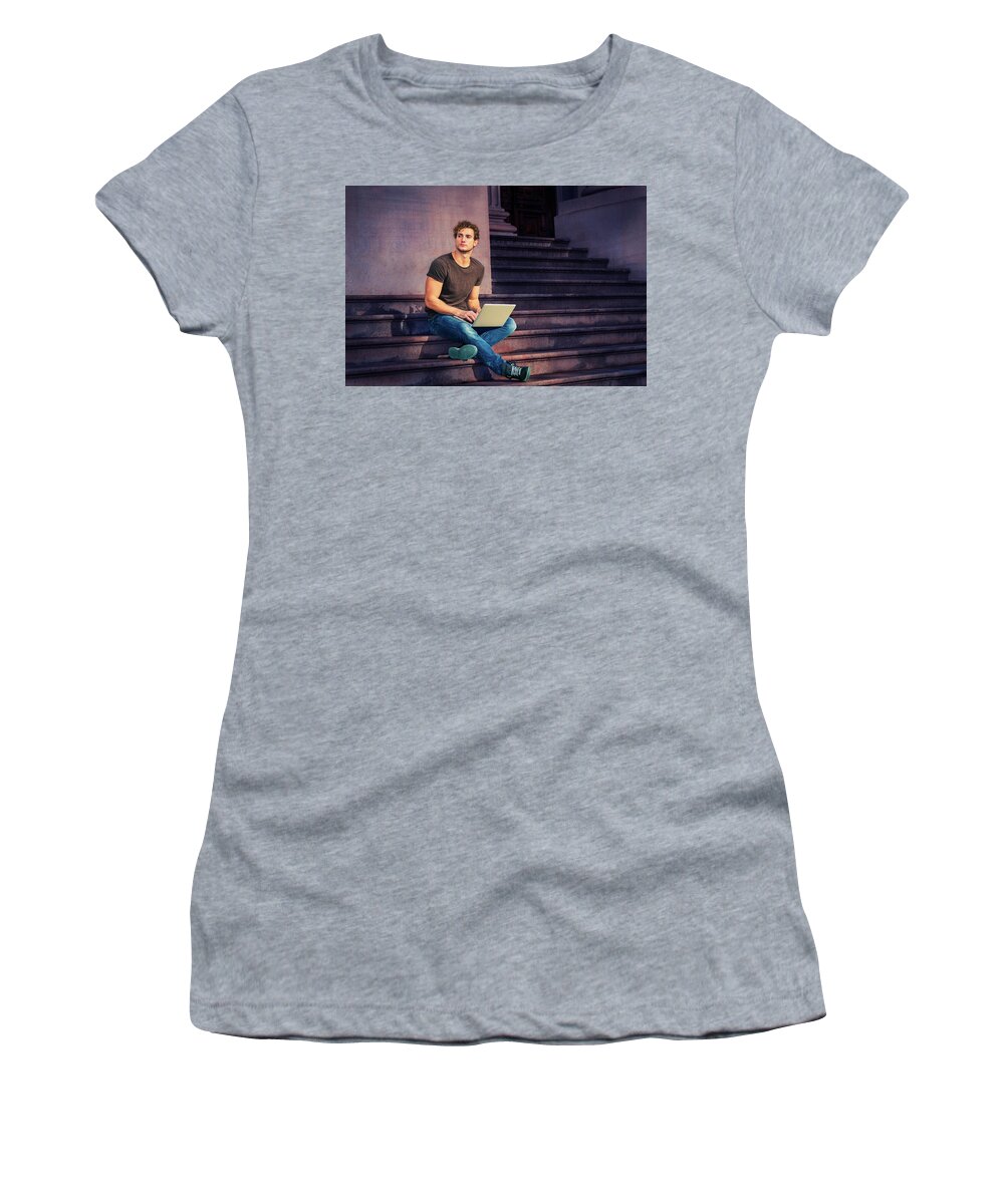 Caucasian Women's T-Shirt featuring the photograph Young Man working on laptop computer, sitting on stairs outside by Alexander Image