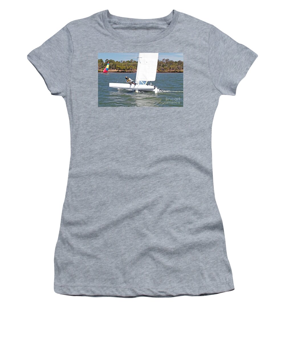 Csne22 Women's T-Shirt featuring the photograph Youth Sailing small catamaran boat with a white sail, Bundaberg, by Geoff Childs