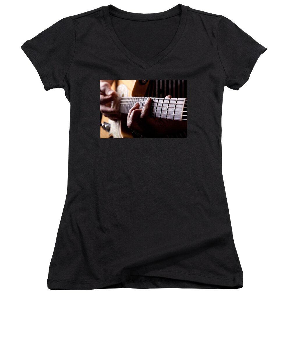 Age Women's V-Neck featuring the photograph Close up shot of a man playing guitar by Kyle Lee