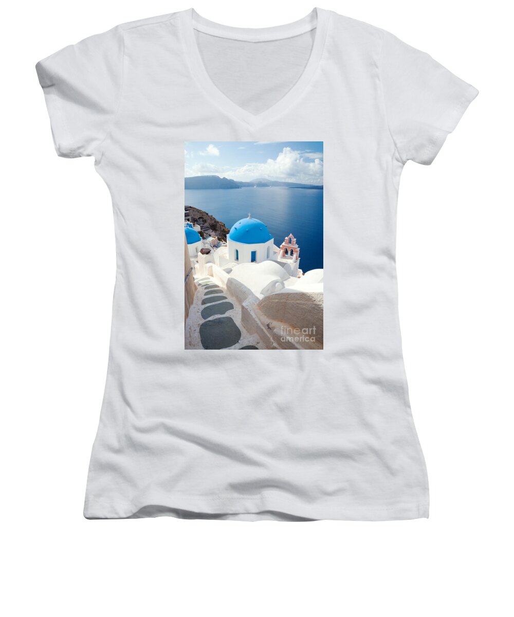 Santorini Women's V-Neck featuring the photograph Iconic blue domed churches in Santorini - Greece by Matteo Colombo