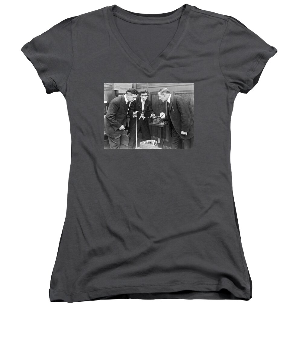 1035-1110 Women's V-Neck featuring the photograph Brokers Checking Ticker Tape by Underwood Archives
