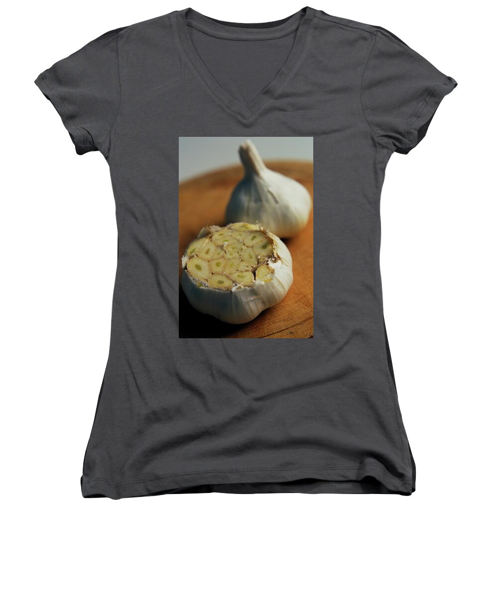 Fruits Women's V-Neck featuring the photograph Two Heads Of Garlic by Romulo Yanes