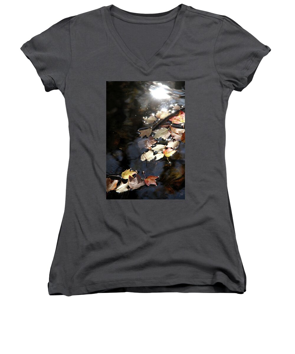 Autumn Women's V-Neck featuring the photograph Dry leaves floating on the surface of a stream by Emanuel Tanjala