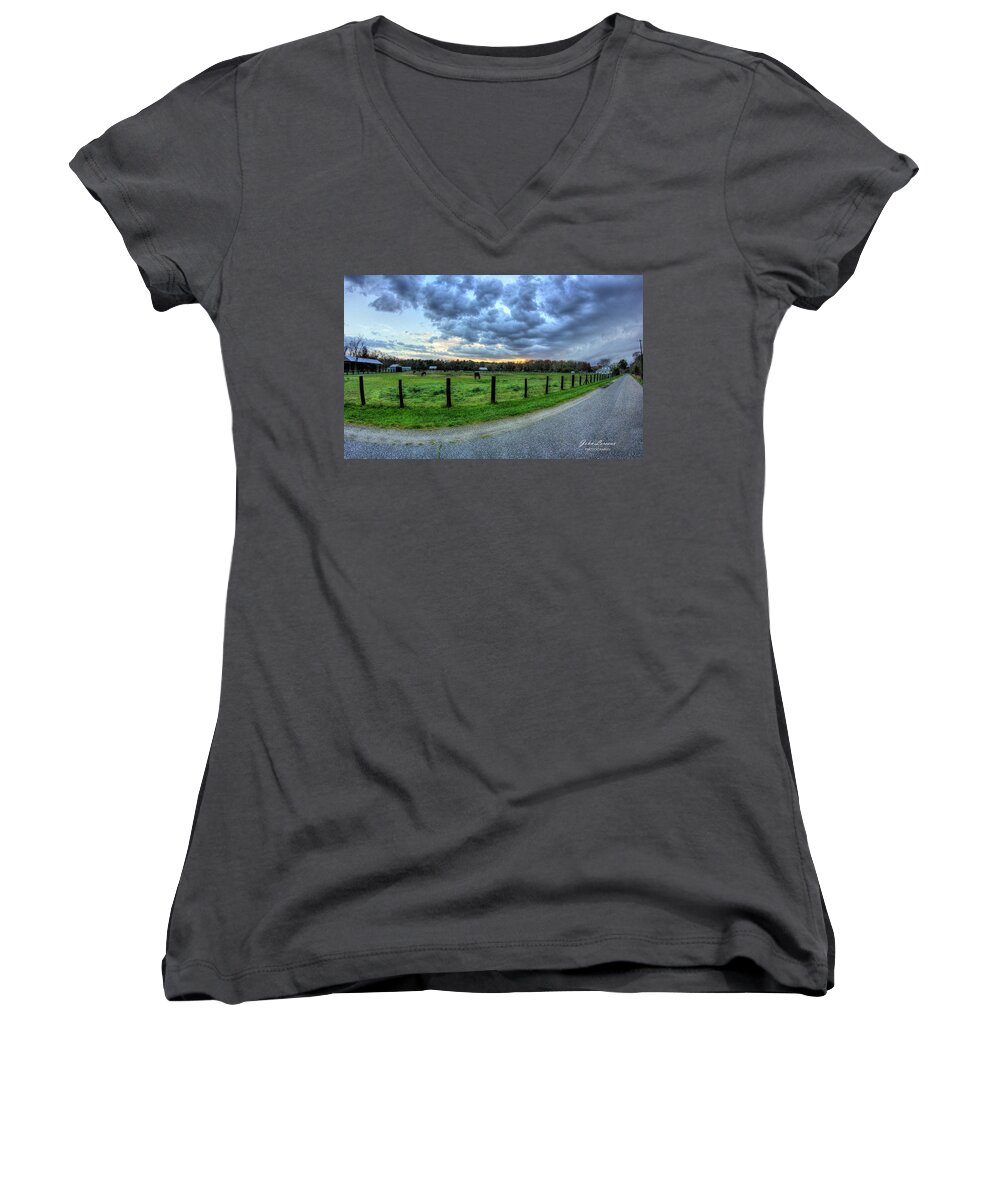Storm Women's V-Neck featuring the photograph Storm clouds over Main Street by John Loreaux
