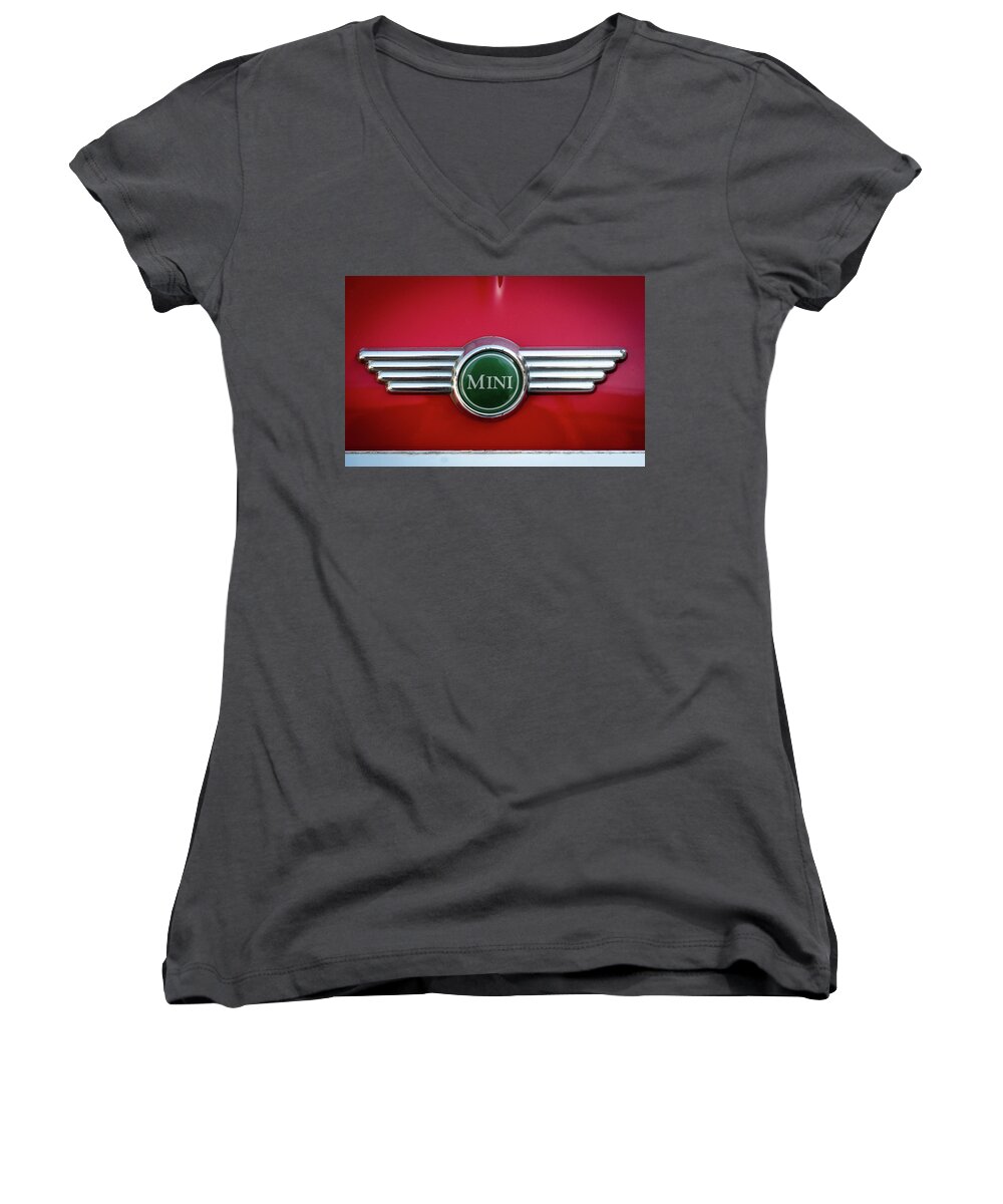 Mini Women's V-Neck featuring the photograph Mini Cooper car logo on red surface by Michalakis Ppalis