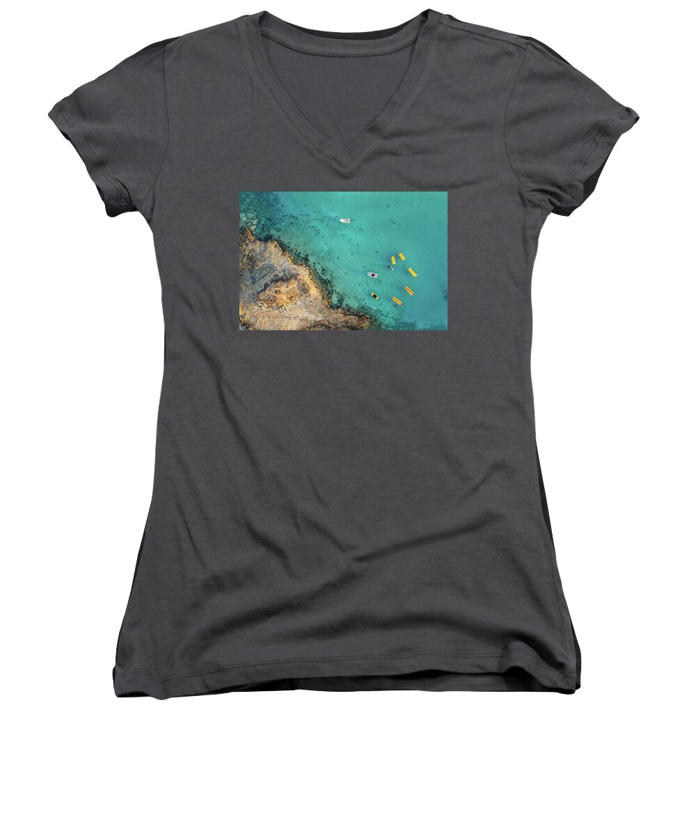 Seascape Women's V-Neck featuring the photograph Drone aerial of seascape with idyllic blue calm blue water. Fig tree bay beach Protaras Cyprus by Michalakis Ppalis