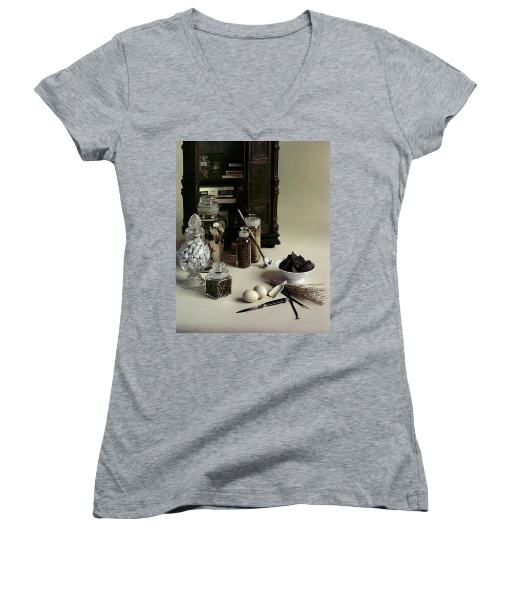 Studio Shot Women's V-Neck featuring the photograph An Assortment Of Chocolate In Glass Jars by Otto Maya