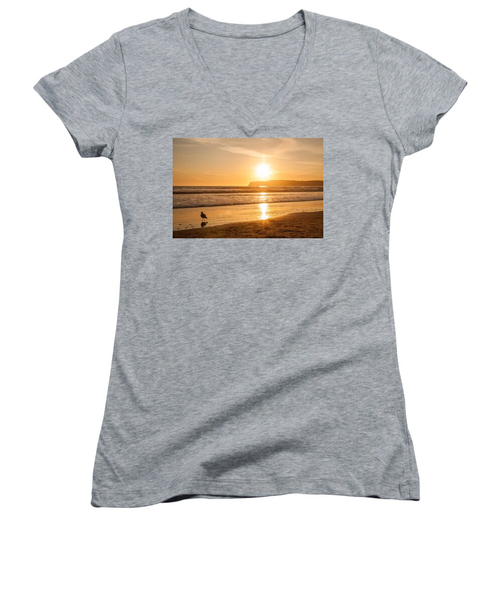 America Women's V-Neck featuring the photograph Bird and his sunset by John Wadleigh
