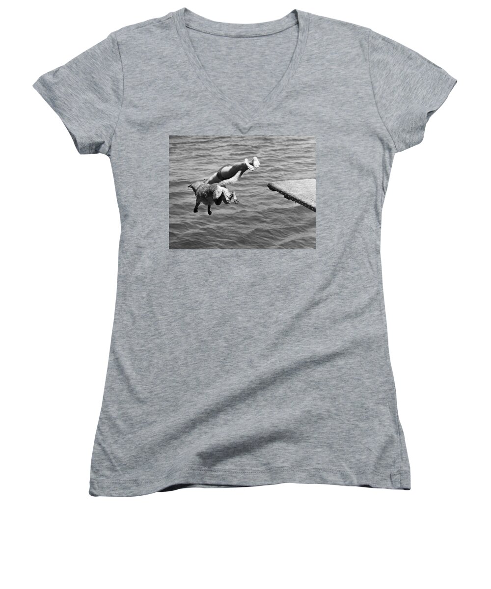 1940 Women's V-Neck featuring the photograph Boy And His Dog Dive Together by Underwood Archives