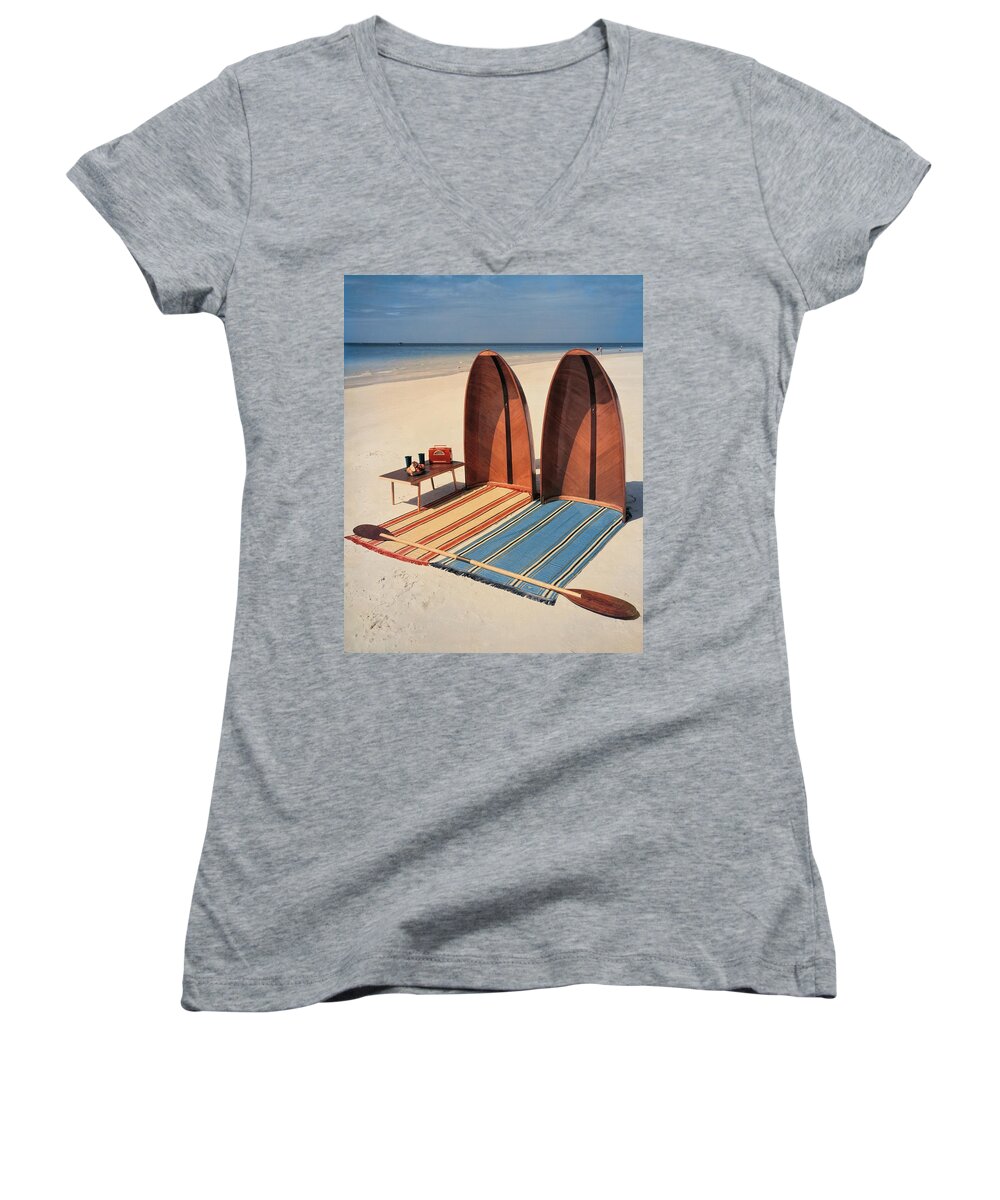 Accessories Women's V-Neck featuring the photograph Pixie Collapsible Boat On The Beach by Lois and Joe Steinmetz