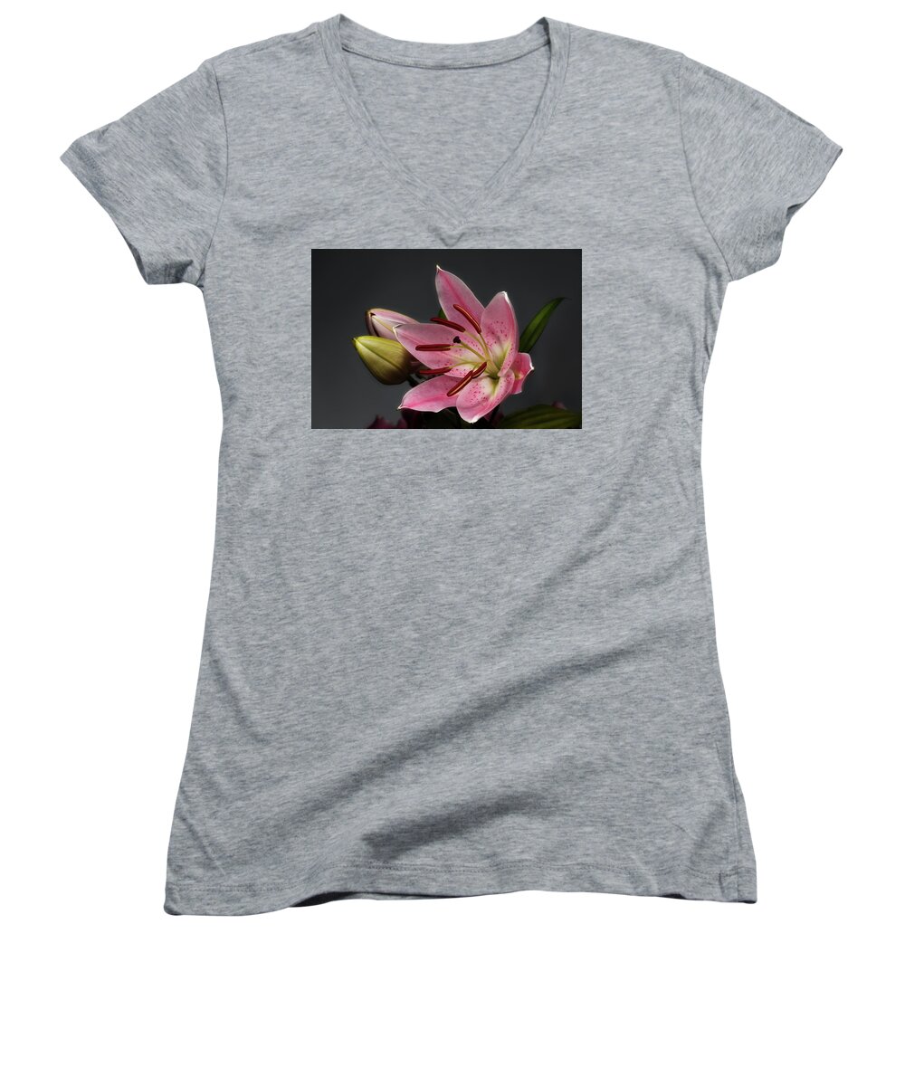 Blossom Women's V-Neck featuring the photograph Blossoming Pink Lily Flower on dark Background by Sergey Taran
