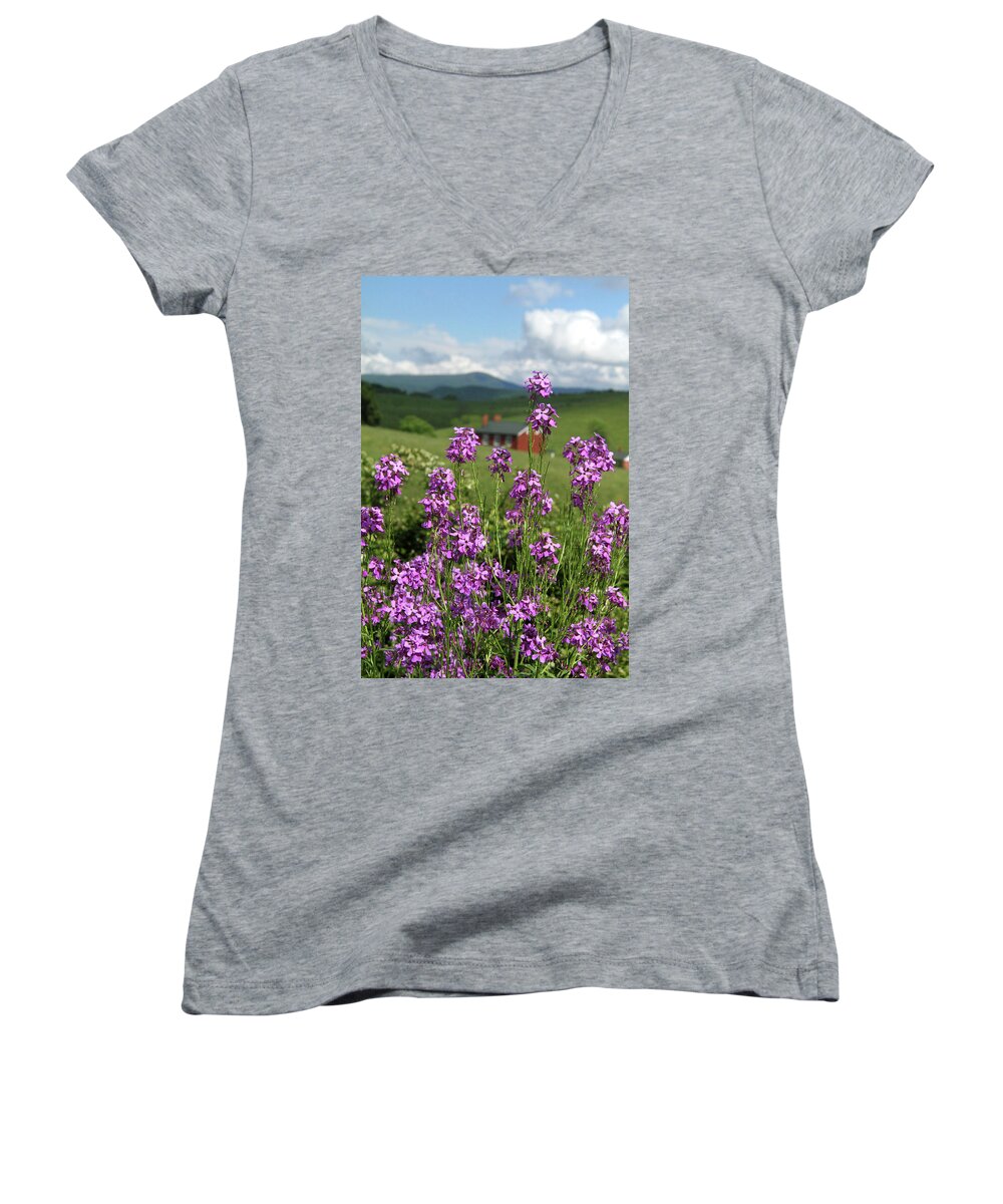 Grass Women's V-Neck featuring the photograph Purple wild flowers on field by Emanuel Tanjala