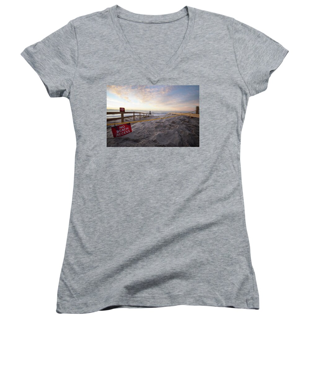 Beach Women's V-Neck featuring the photograph Sunrise after a storm on the beach. #1 by Kyle Lee