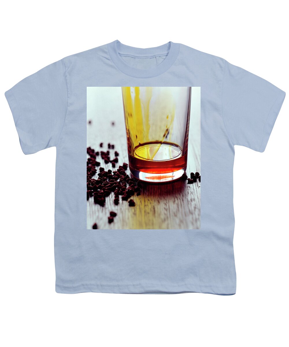 Cooking Youth T-Shirt featuring the photograph Annatto Seeds With A Glass by Romulo Yanes