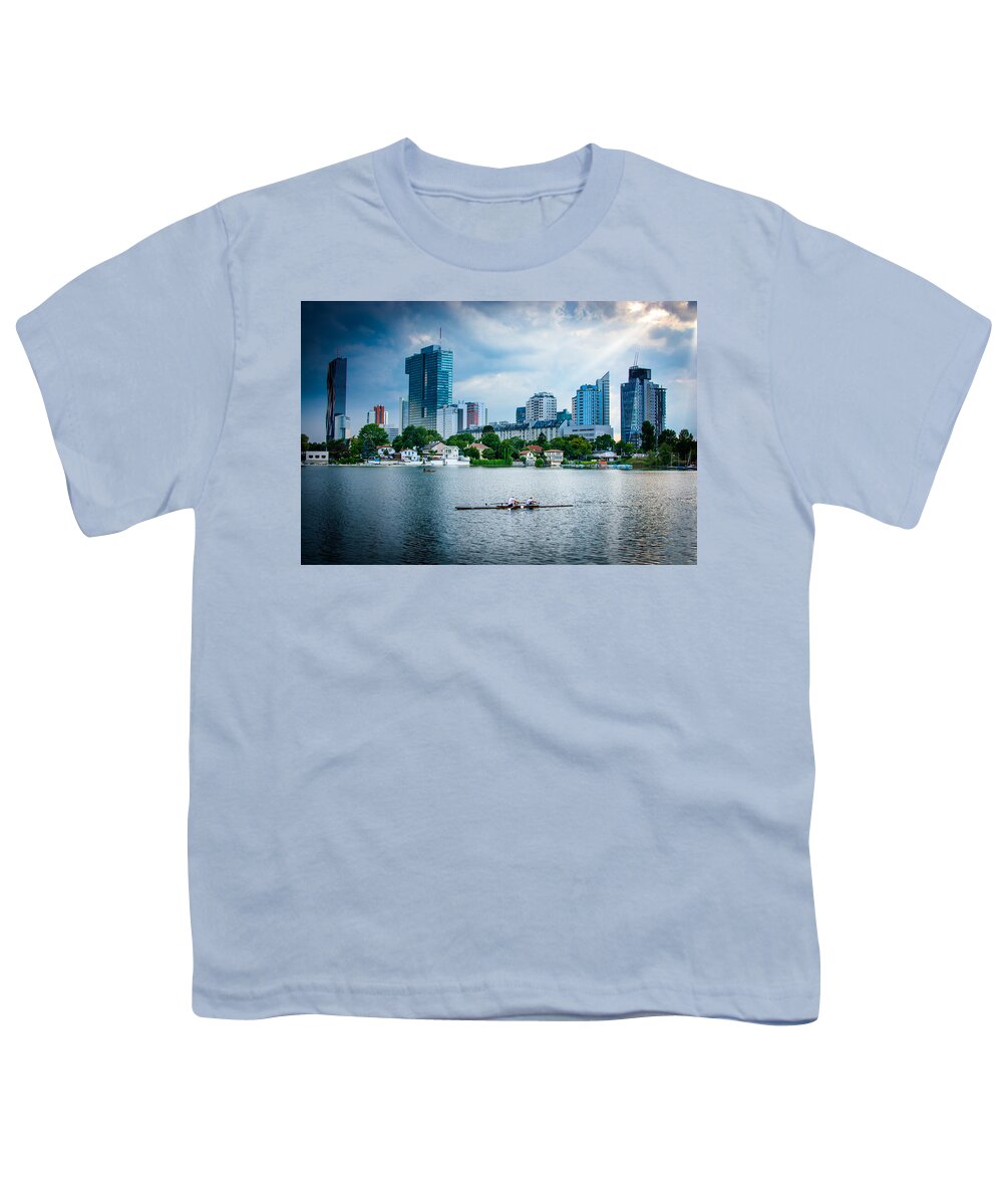 Skyline Youth T-Shirt featuring the photograph Rowing Boat And The Skyline Of Vienna by Andreas Berthold