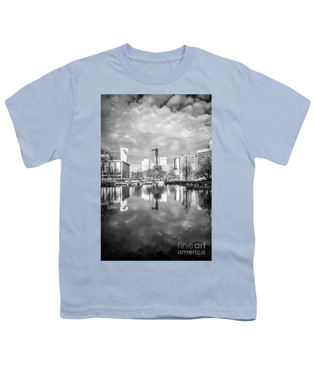 America Youth T-Shirt featuring the photograph Charlotte Skyline Reflection on Marshall Park Pond #1 by Paul Velgos