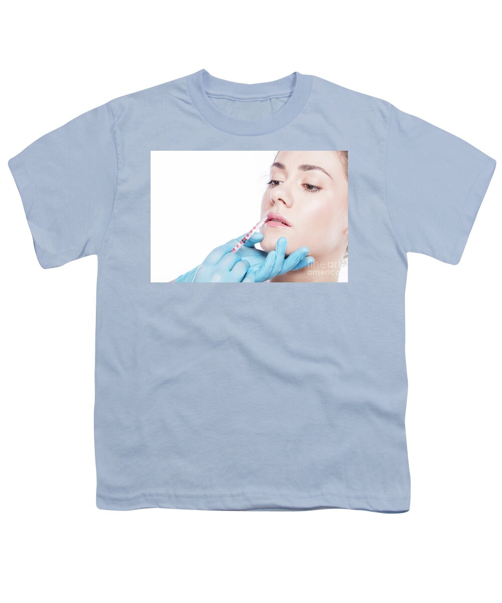 Aesthetic Youth T-Shirt featuring the photograph Young woman having lip-plumping injections. by Michal Bednarek