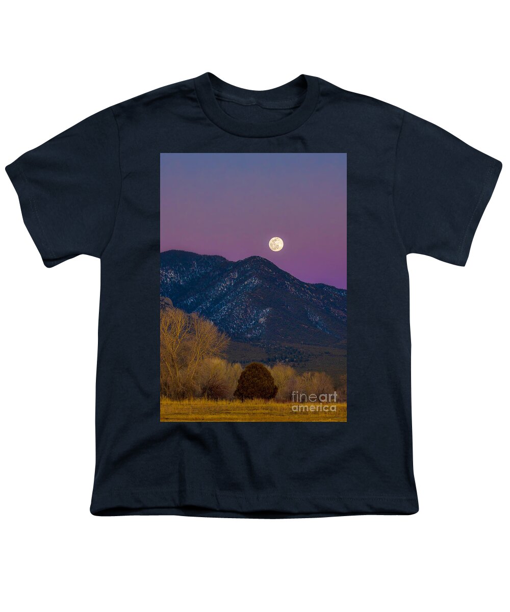 Taos Youth T-Shirt featuring the photograph Snow Moon over Taos Mountain #1 by Elijah Rael
