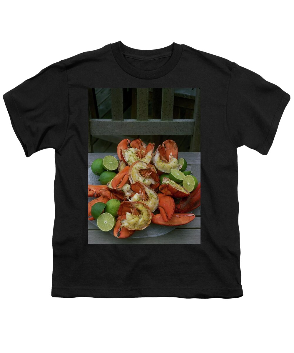 Cooking Youth T-Shirt featuring the photograph A Meal With Lobster And Limes #1 by Romulo Yanes