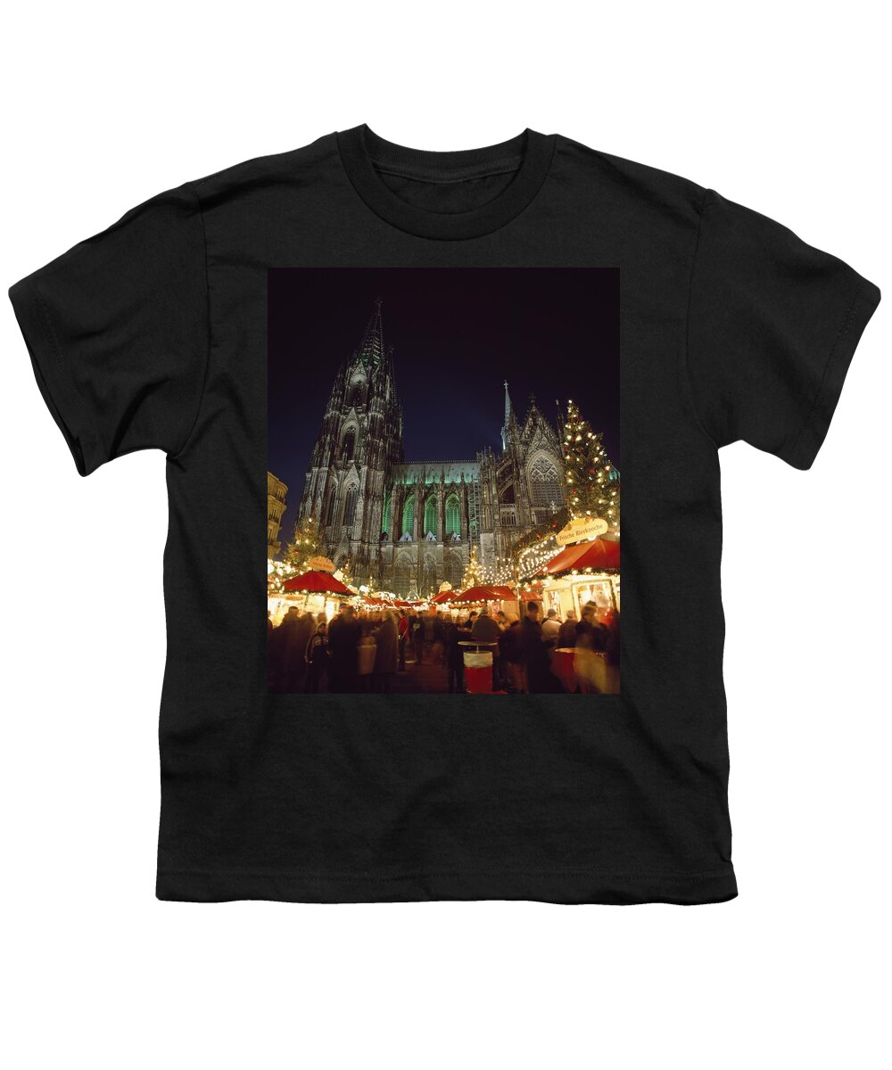 Photography Youth T-Shirt featuring the photograph Cologne Cathedral And Christmas Market #1 by Axiom Photographic