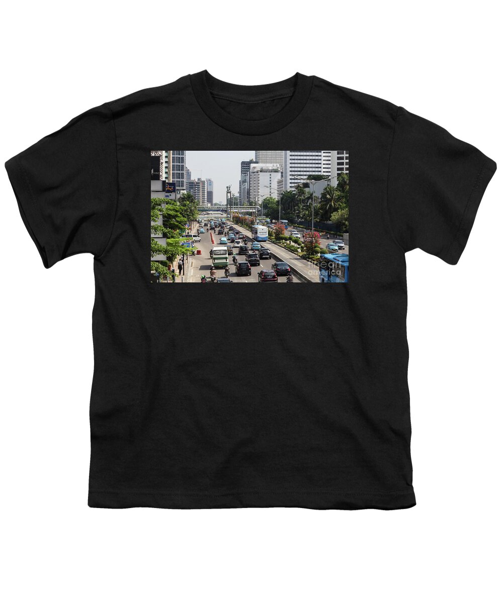 Capital Cities Youth T-Shirt featuring the photograph Traffic along Sudirman avenue in Jakarta, Indonesia capital city #4 by Didier Marti