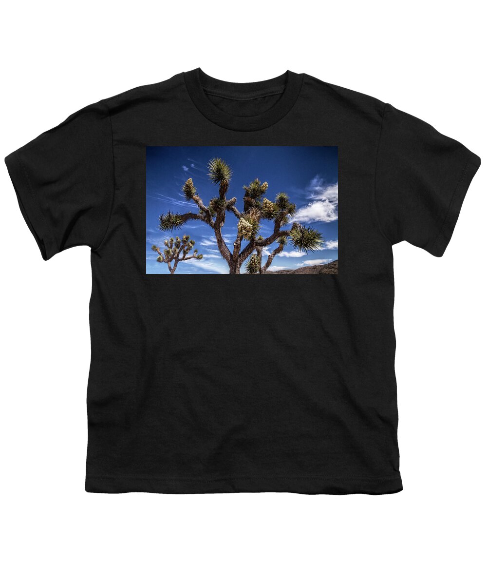 California Youth T-Shirt featuring the photograph Joshua Trees and Clouds in Joshua Tree National Park by Randall Nyhof