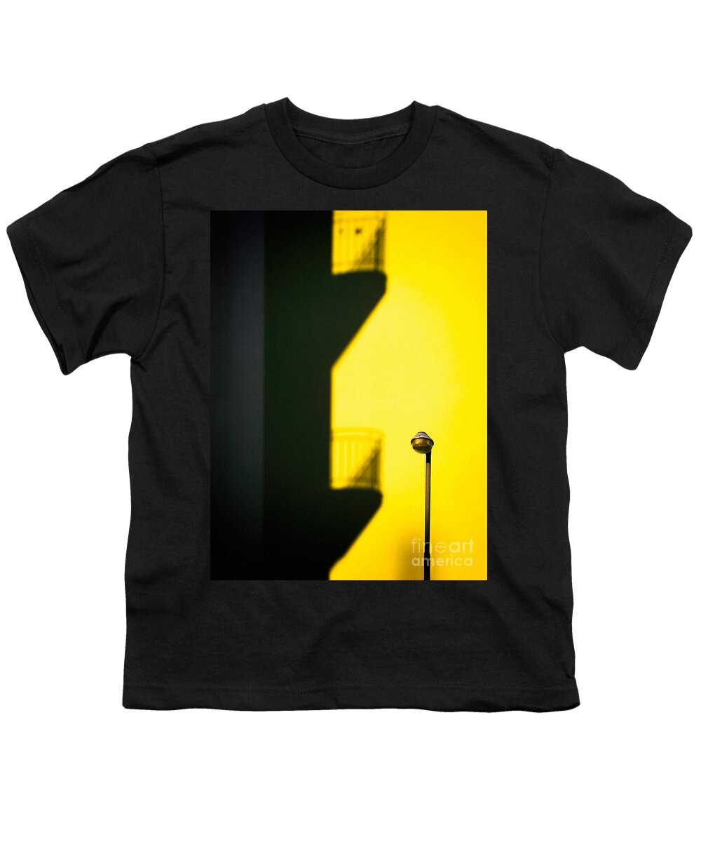 Architecture Youth T-Shirt featuring the photograph Streetlamp and balconies shadow by Silvia Ganora