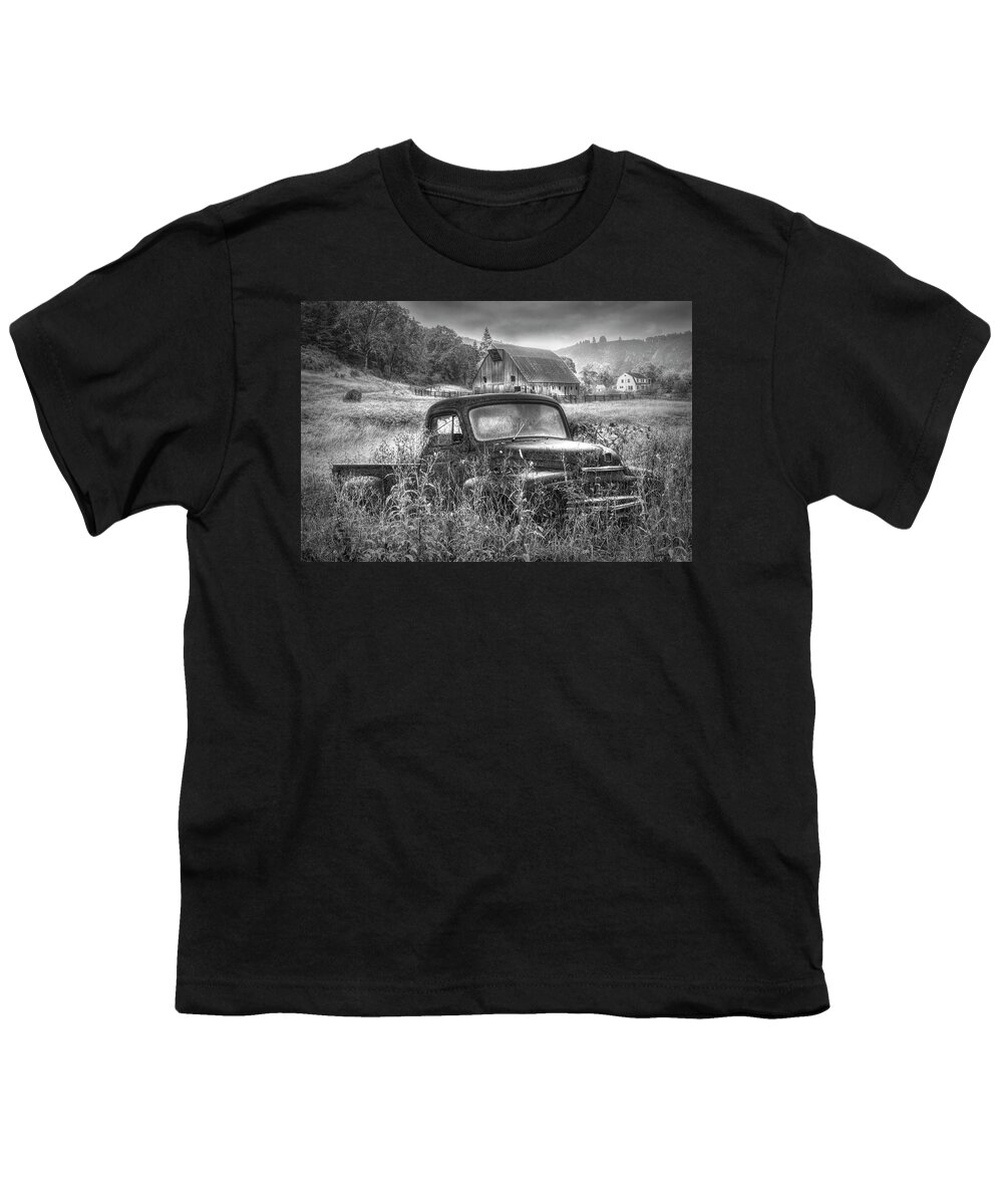 Barns Youth T-Shirt featuring the photograph Rusty Truck Deep in the Wildflowers in Black and White by Debra and Dave Vanderlaan
