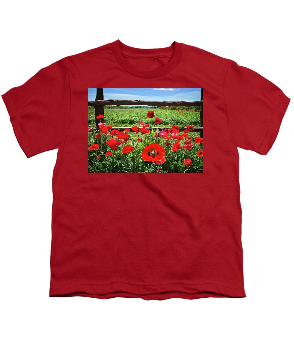 Red Corn Poppies Youth T-Shirt featuring the photograph Red Corn Poppies at the Fence by Lynn Bauer