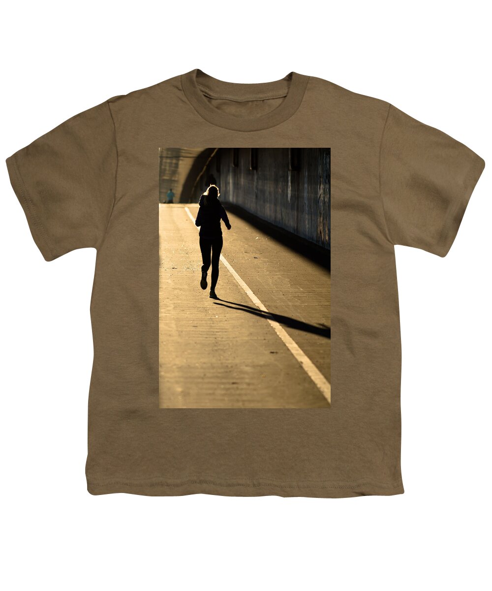 Girl Youth T-Shirt featuring the photograph Female Jogger In Backlight by Andreas Berthold